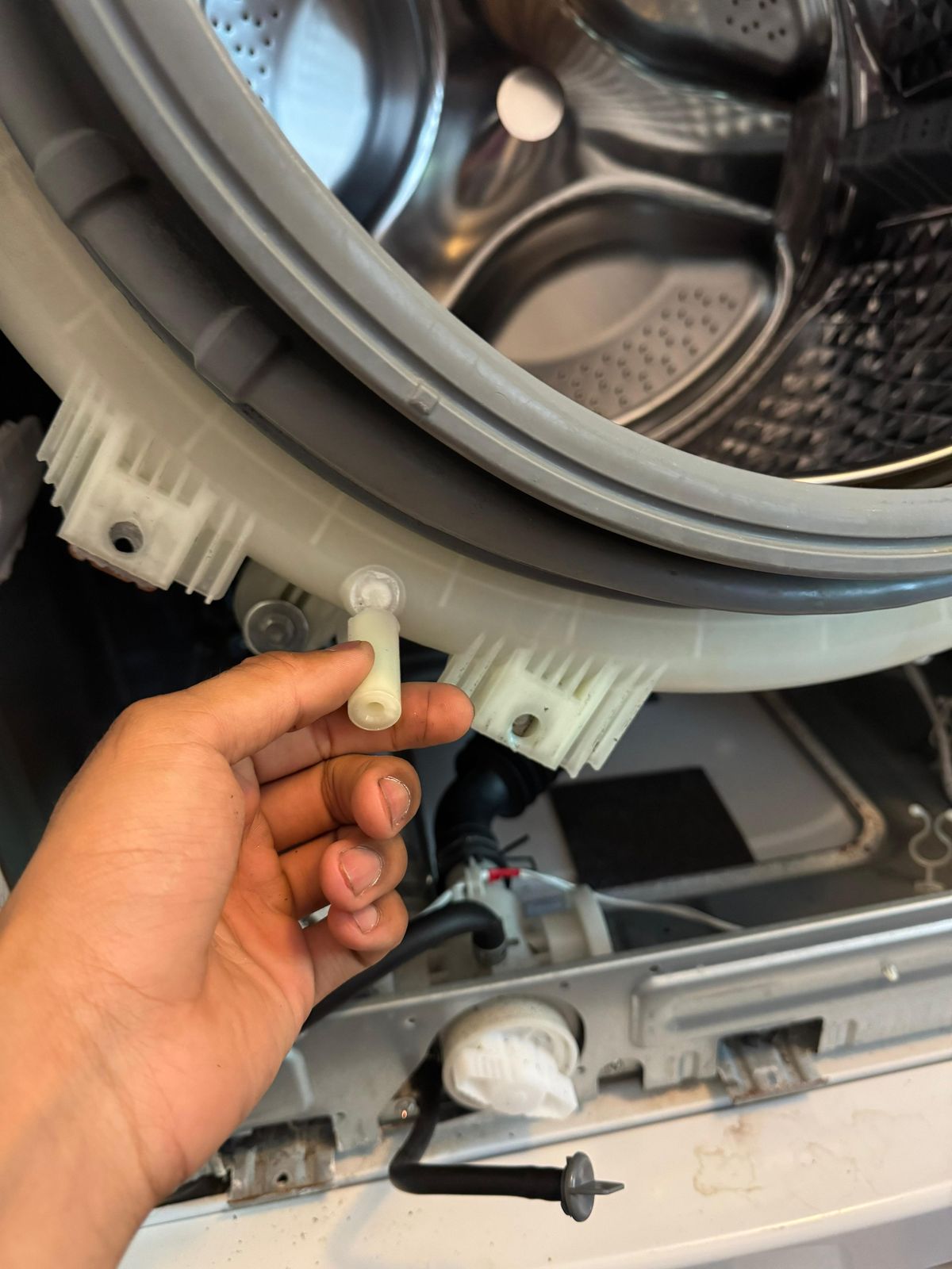Front-load washer opened up for drum and seal work