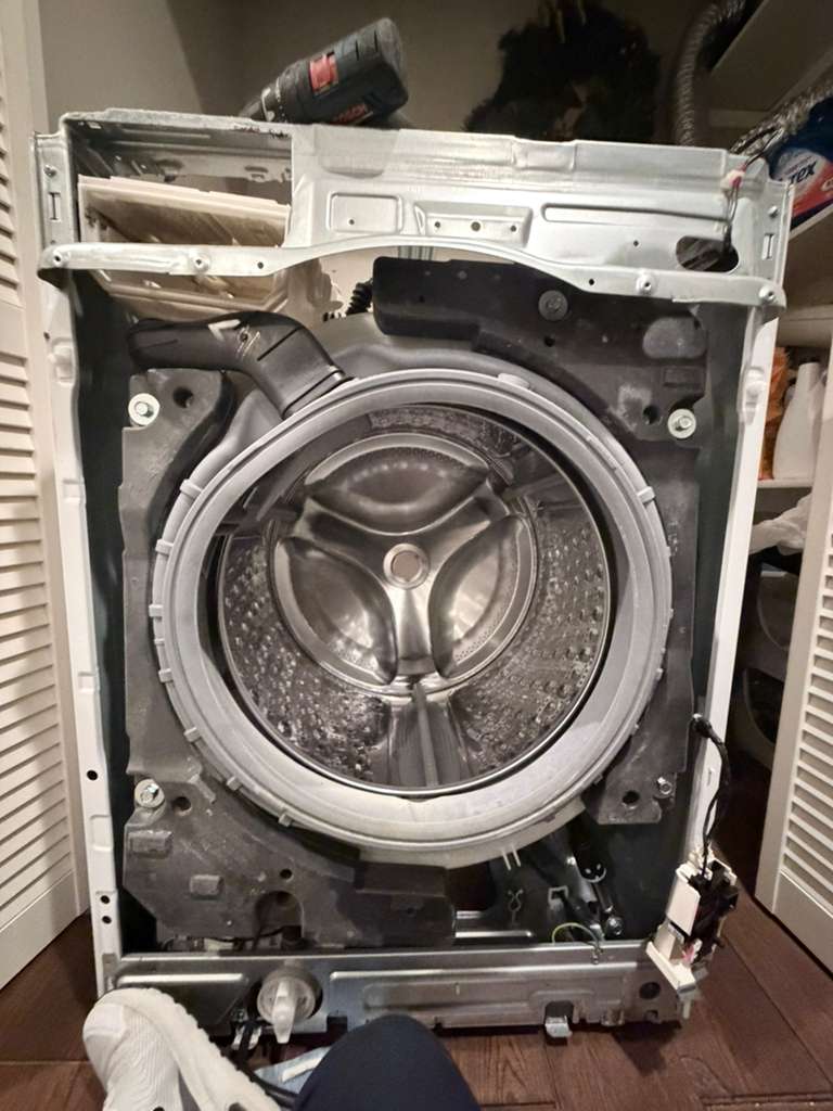 OnSpot technician servicing a washer drum